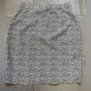 Silk skirt in cream & navy modern floral. Fully lined w bit of elastic at waist